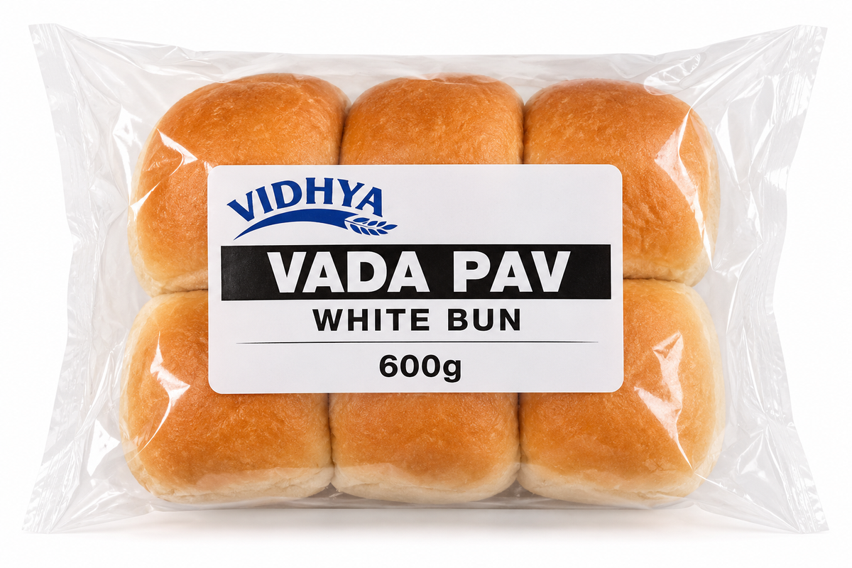 Vidhya Vada Pav White Bun 600g in clear plastic packaging containing soft golden-brown buns with a white label featuring the Vidhya brand logo and product name.