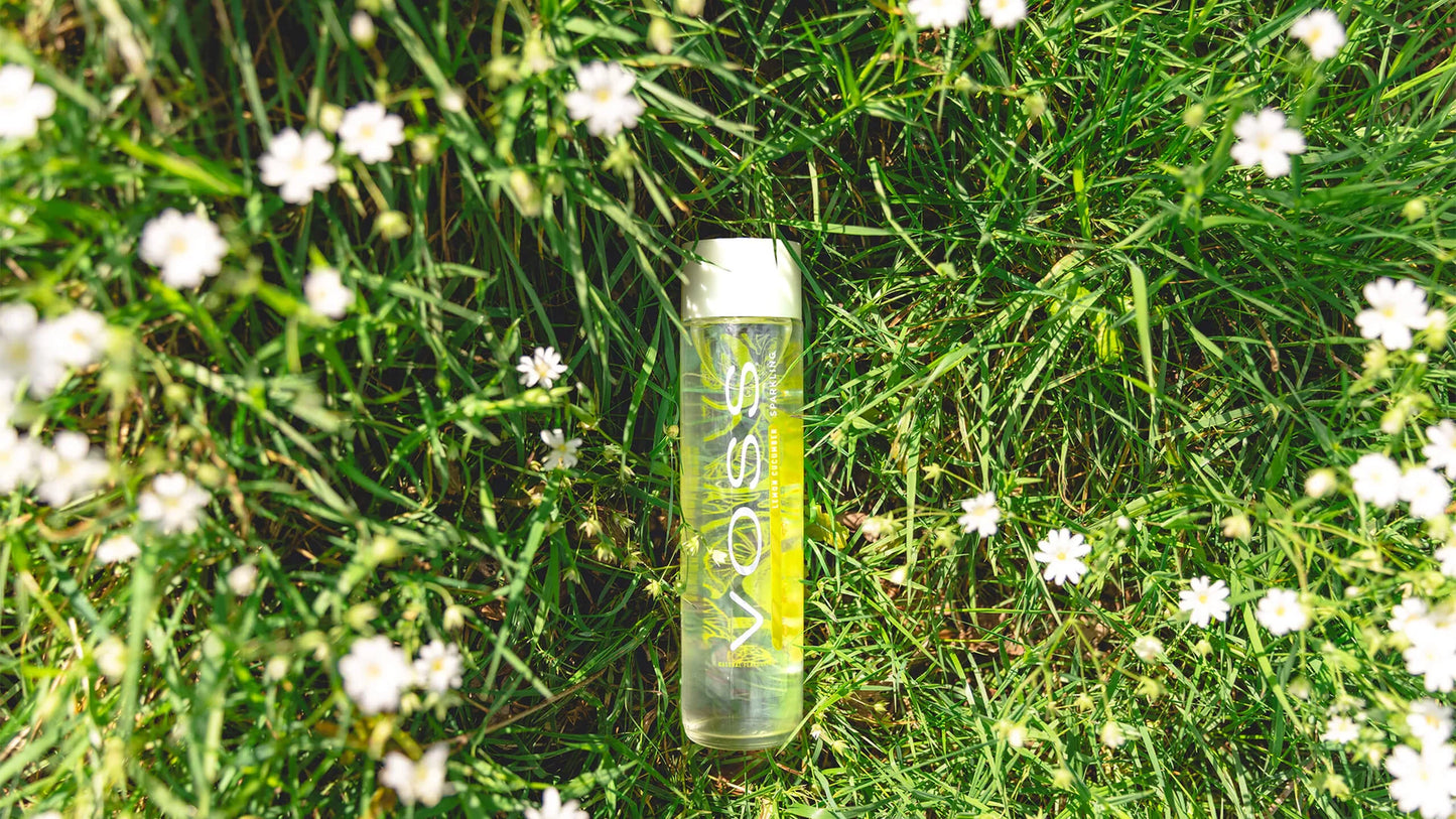Voss Lime Mint Sparkling Water in a clear 375 ml glass bottle with lime and mint flavor label
